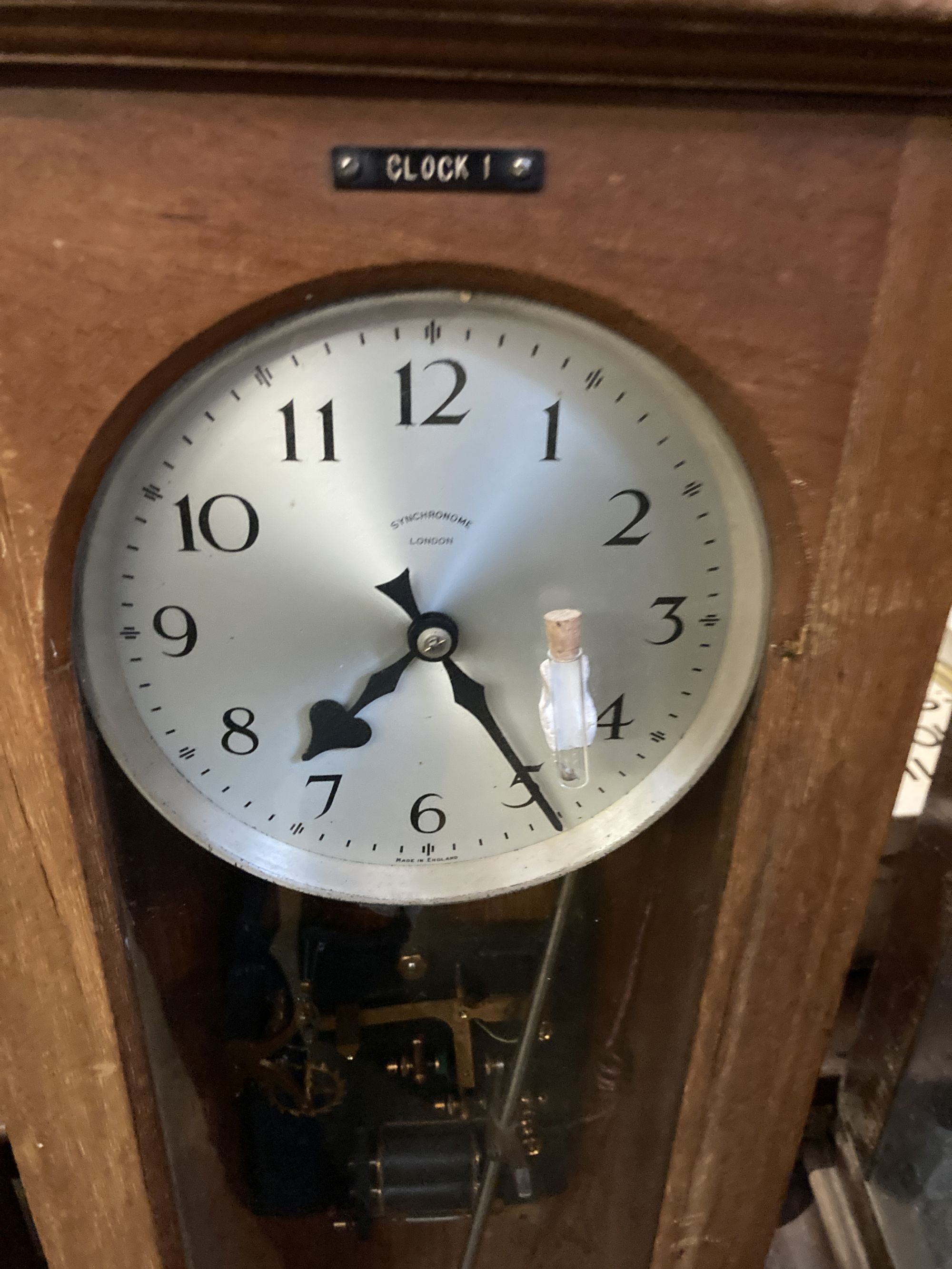 A mid 20th century teak cased Synchronome master clock, height 128cm